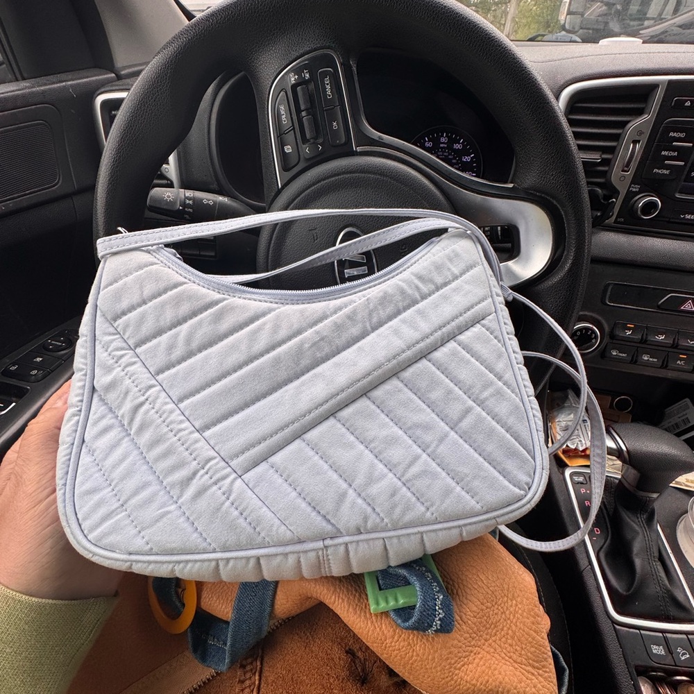 light blue quilted Vera Bradley Frannie Crescent Crossbody Bag